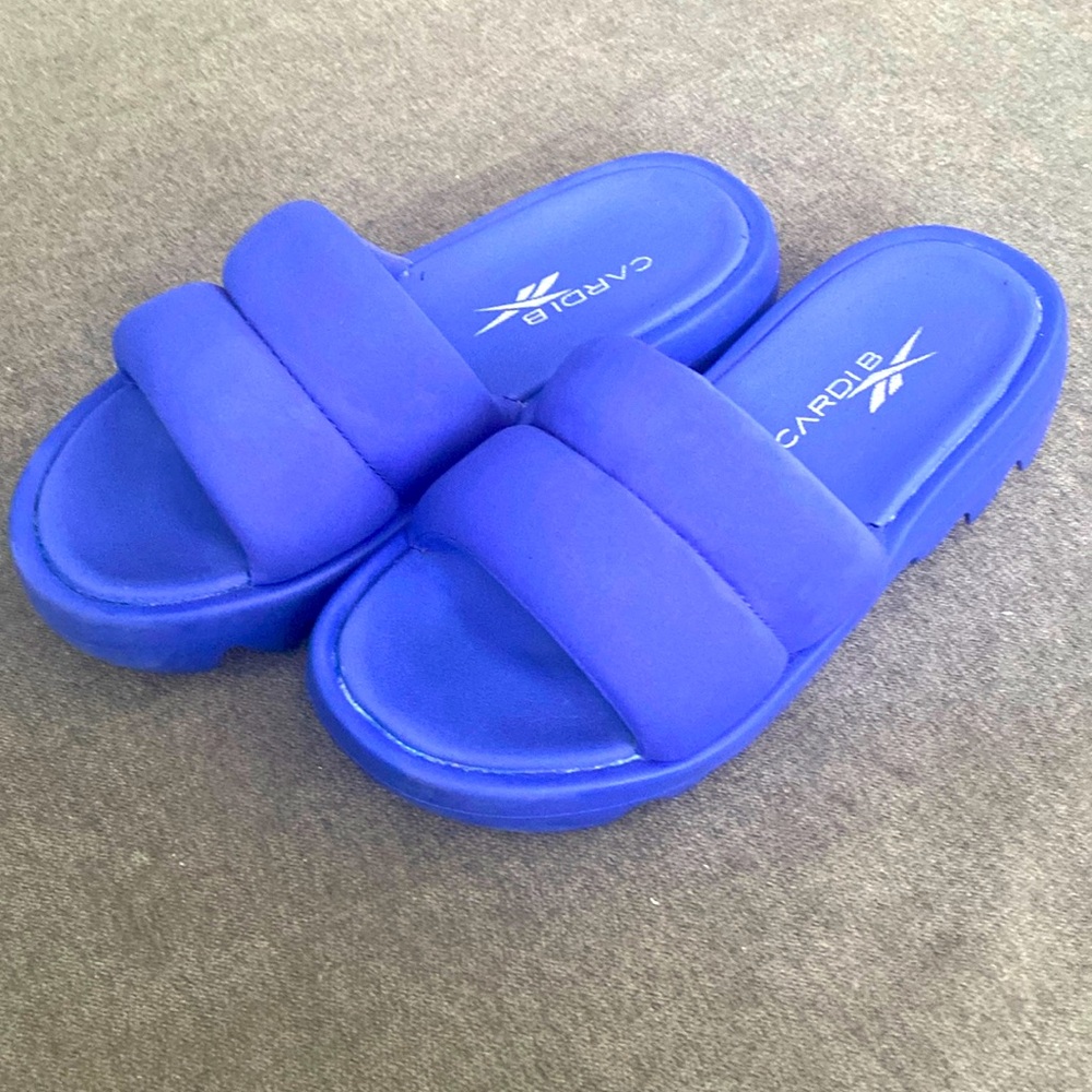 Cardi B Reebok purple slides